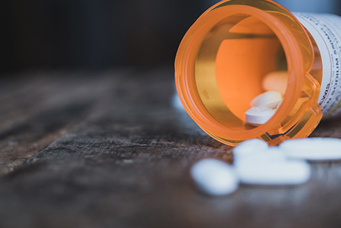 spilled prescription bottle with pills