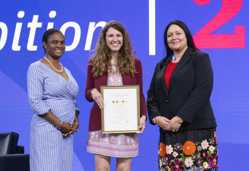 Natalie Taylor (center), associate professor and director of the College of Arts and Sciences’ School of Information, is the recipient of the American Library Association’s Beta Phi Mu Award for her distinguished service to education for librarianship. (Photo courtesy of Natalie Taylor)