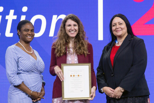 Natalie Taylor (center), associate professor and director of the College of Arts and Sciences’ School of Information, is the recipient of the American Library Association’s Beta Phi Mu Award for her distinguished service to education for librarianship. (Photo courtesy of Natalie Taylor)