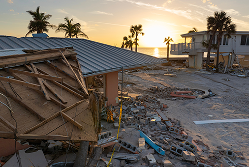 destruction of home on beach from hurricane