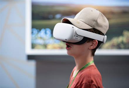 A camper working exploring an archaeological site in virtual reality (VR) technology. (Photo credit: Corey Lepak)