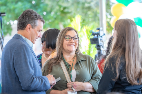 Victoria Ramirez and Paul Kirchman talk with a student during the groundbreaking of the new STEM academic facility