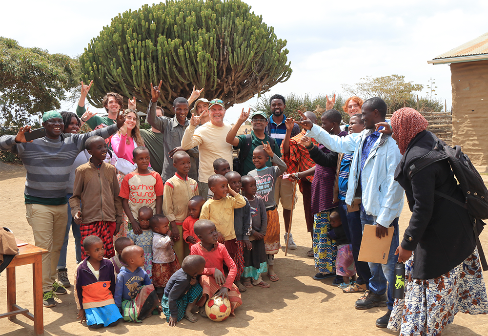 research team with locals in Tanzania
