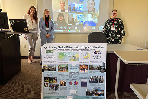 Political Science Professor Judithanne Scourfield McLauchlan (right) and USF students highlight international research they conducted with students and faculty in Moldova in the spring of 2022.