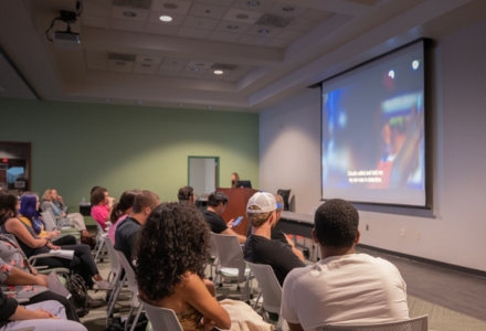 Attendees watching the docudrama “Los Infiltrados” at the 13th Annual Spanish Fair and Expo. (Photo by Alessandra Casanova)