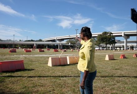 Dr. Jackson examining sites of covered Black cemeteries located in St. Peterburg, Fla. (Photo by Alessandra Casanova)