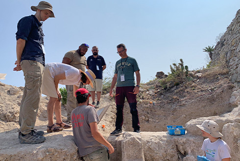 The Deputy Chief of Mission of the U.S. Embassy in Malta, Angela Cervetti, visited the archaeological excavation site to meet USF students and USF IDEx staff members to learn more about the dig and their role in the international research project. Photo by Davide Tanasi