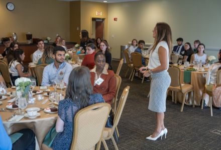 Sashy O’Connor (right) presenting at the etiquette luncheon. (Photo by Dakota Galvin)