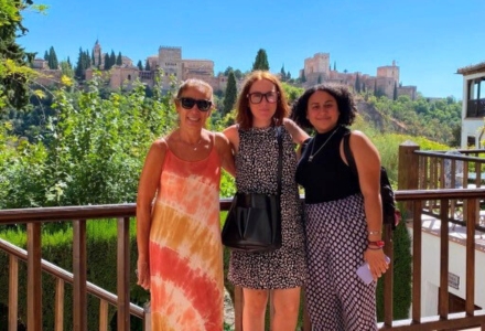 Vaillant Cruz (right) with her Fulbright affiliate, Dr. Antonia Olmos Alcaraz (center), and her USF mentor, Dr. Beatriz Padilla (left), in front of the Alhambra at Carmen de la Victoria as they visit professor residences at the University of Granada. (Photo courtesy of Vaillant Cruz)