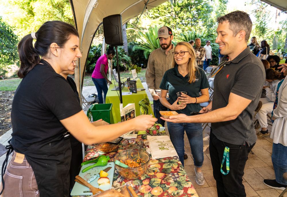 Attendees visit tabling organizations for tastings, networking, and educational engagement. (Photo by JWS Photography)