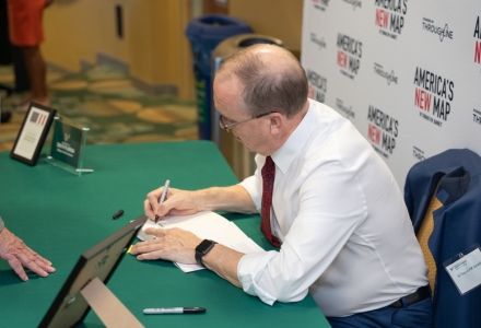 Barnett signed copies of his book with attendees after the discussion. (Photo by Corey Lepak)
