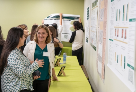 Eight students shared their latest findings during the research and policy showcase via poster presentations. (Photo by Corey Lepak)