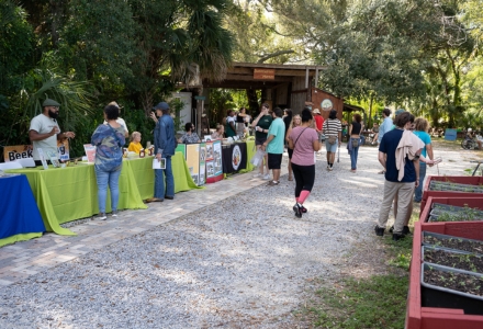 Attendees had an opportunity to speak with local organizations about the work they are doing locally to improve food systems in Tampa Bay. (Photo by Corey Lepak)
