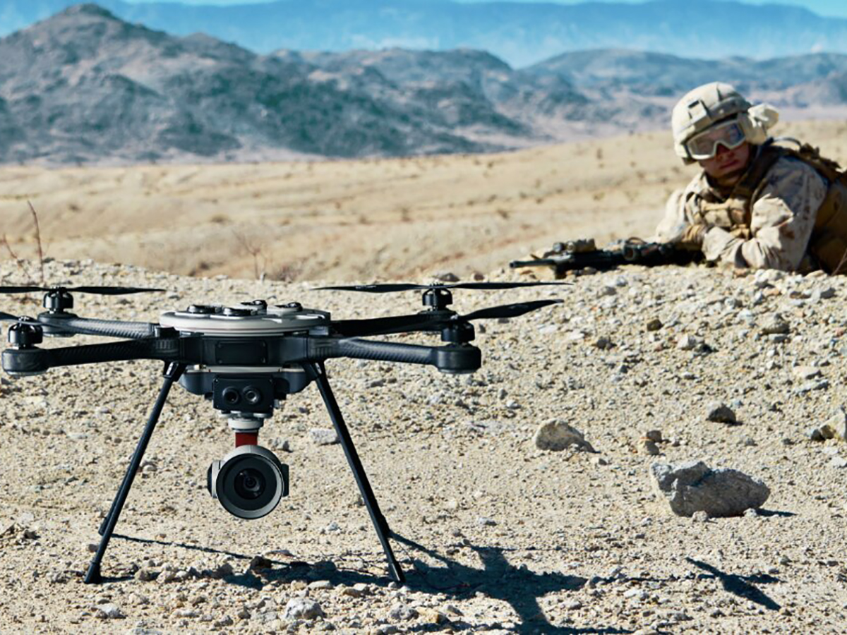 drone in desert landscape with soldier