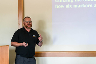 Photo of Christopher Turner giving a presentation