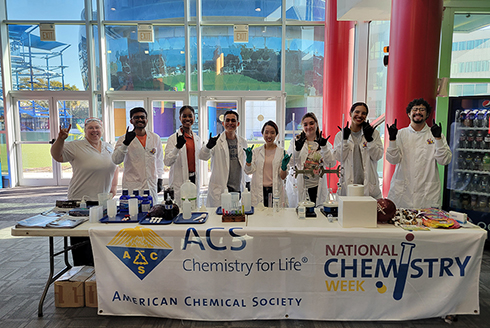 (From left) Chemistry department faculty member Dr. Kimberly Fields, USF student volunteers Anad Patel, Corissa Quarterman, Elliot Santaella Aguilar, associate professor of instruction Dr. Christie Tang, and USF student volunteers Nour El Hoda Malone, Sofia Osuna, and Justin Ramos at MOSI. (Photo courtesy of Corissa Quarterman)