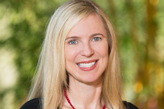 Headshot of Tiffany Chenneville smiling into the camera