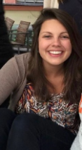 Headshot of Rebecca Arrowsmith smiling into the camera