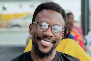 Olajide Omojarabi headshot