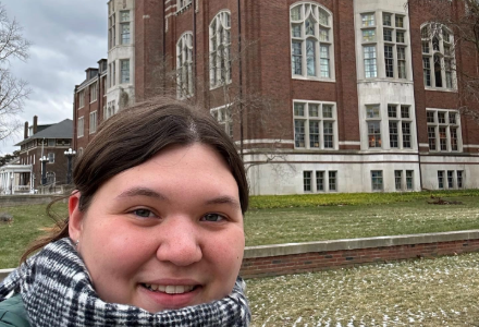 Abigail Reed in front of the Michigan's university student union