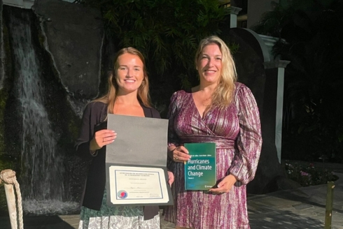 (From left) Geography master’s student Megan Blair with Dr. Jennifer Collins, associate professor in the School of Geosciences and lead organizer of the Hurricane Risk in a Changing Climate Symposium. (Photo courtesy of Jennifer Collins)