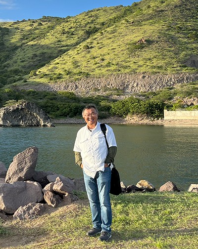Dr Wang on beach