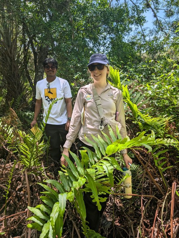 Bethany and Dhrubo in the field