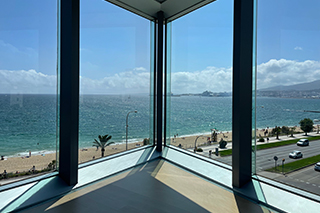 glass window with view of beach