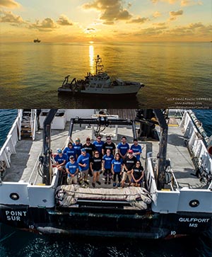 crew standing on deck by the water