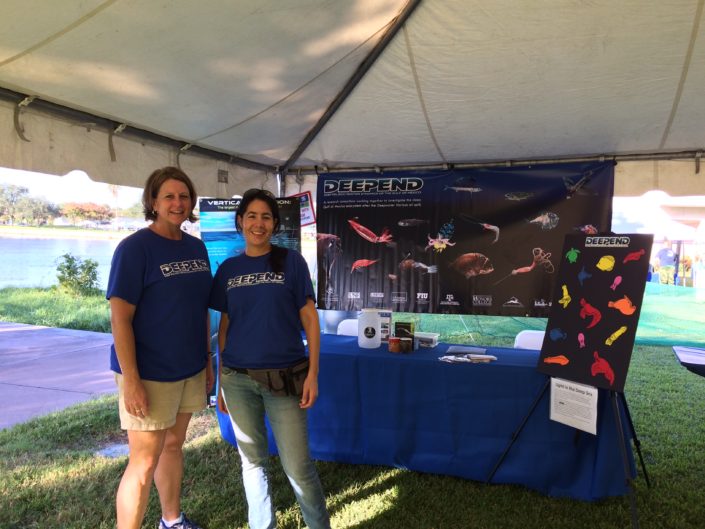 Dr. Judkins and student at St Petersburg Science Festival booth