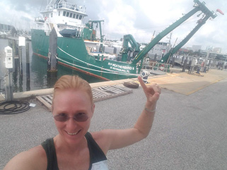 Lisa in front of research ship