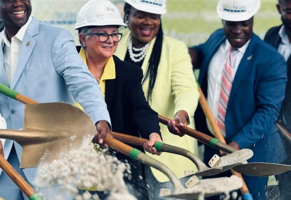 Lucia Martinez Gonzalez (left middle) at groundbreaking ceremony alongside Councilwoman Kassandra Timothe (right middle). 