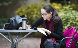 student studying outdoors