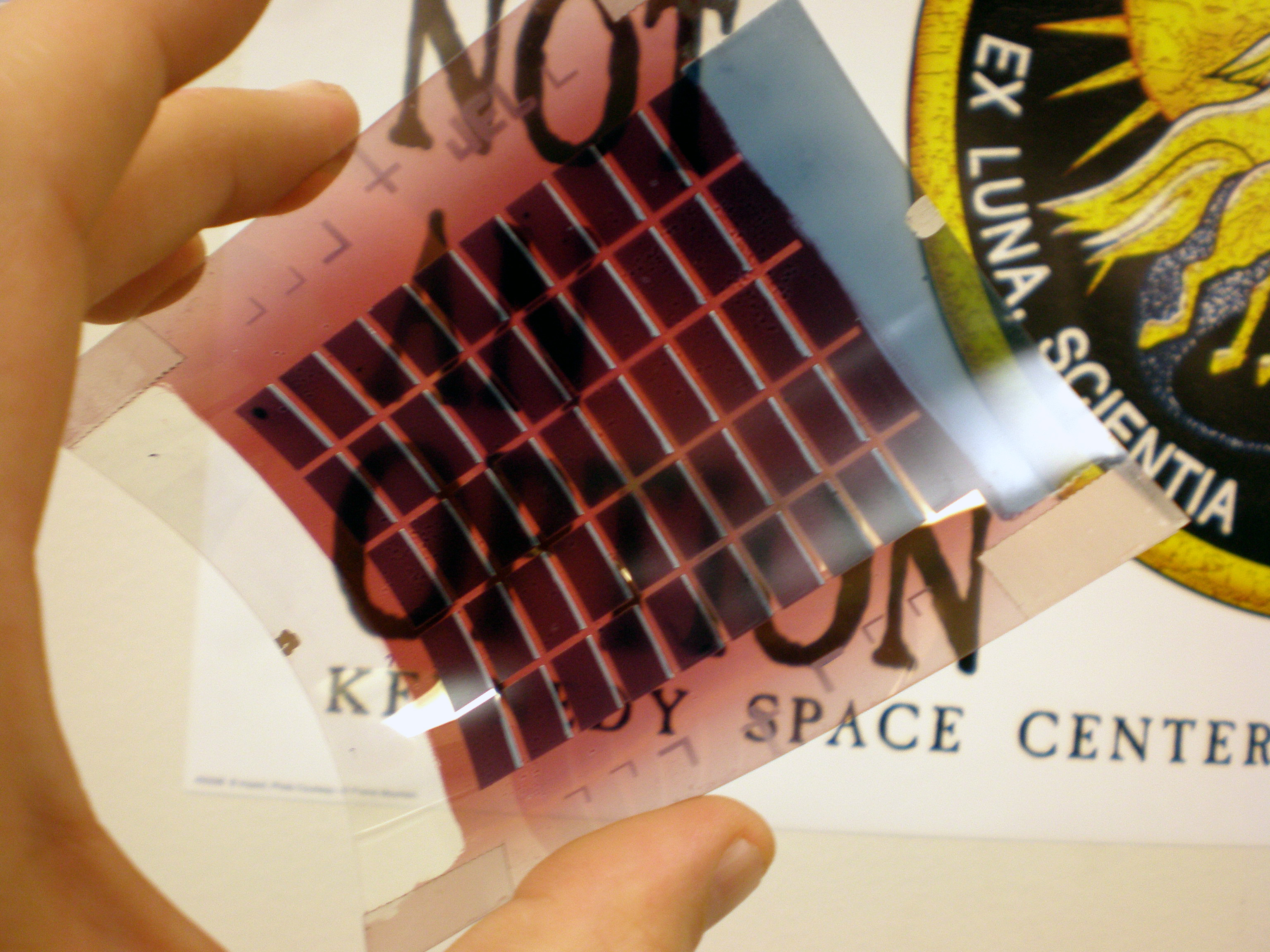 Flexible semitransparent solar array
