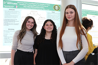 Three poster presenters