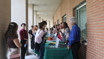 Keynote speaker with attendees