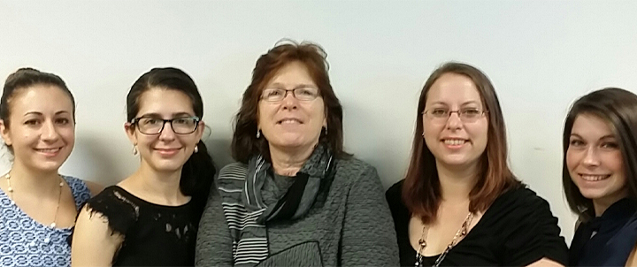 Dr. Schneider with four graduate students