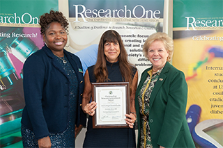 Christine Ruva Receives Outstanding Research Achievement Award