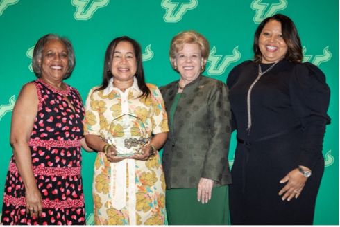 Mifflin (second from left) poses with USF President Rhea Law (third from left) during 2023 Joyce Russell Kente Awards and Scholarship Ceremony. (Photo courtesy of USF Alumni Association)