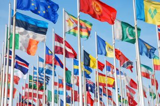 world flags on flagpoles