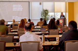 Conference room audience and guest speaker