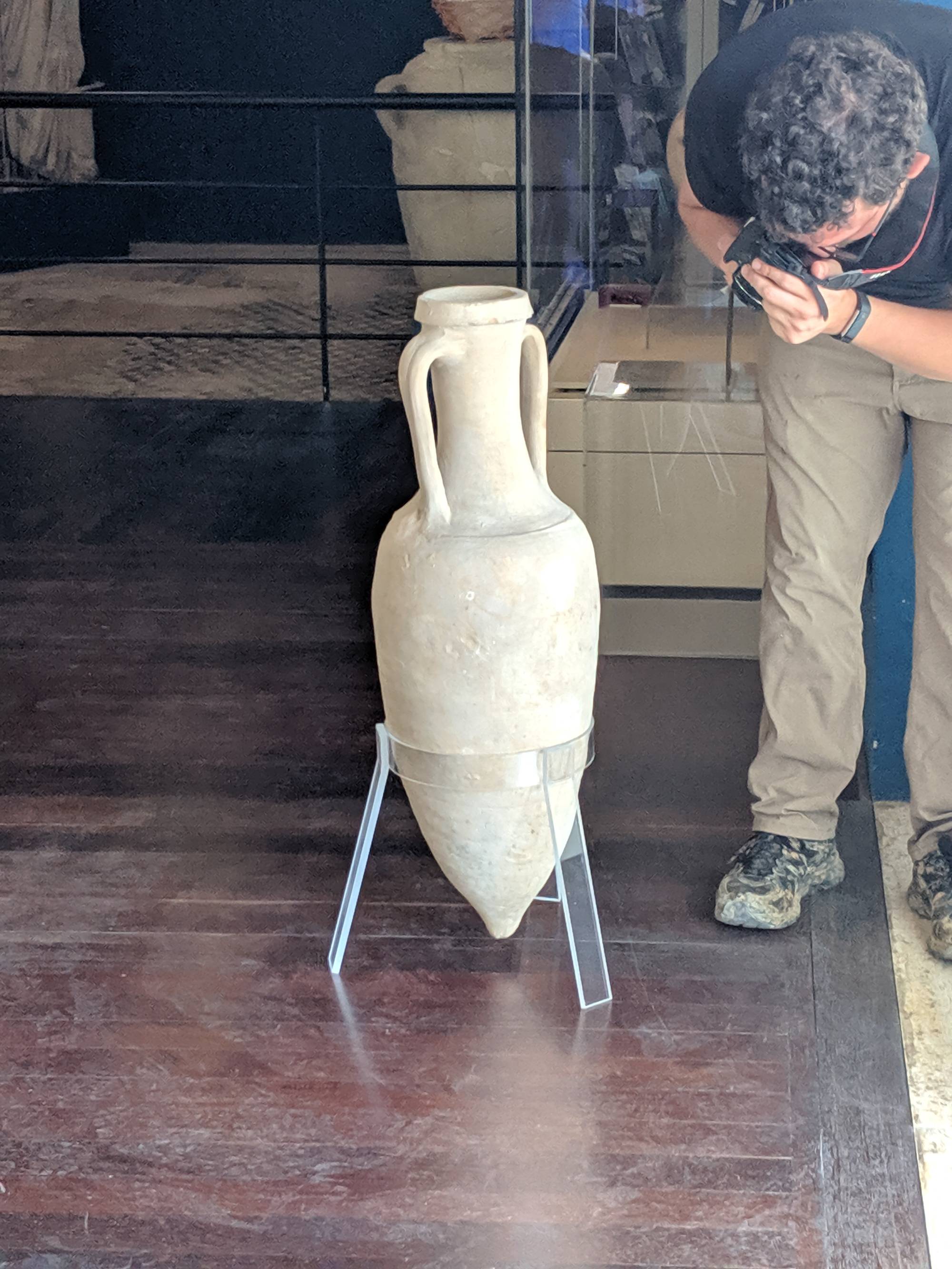 Davide photographing vase