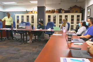 Dr. Antoinette Jackson leading a discussion with graduate students in the Department of Anthropology at USF