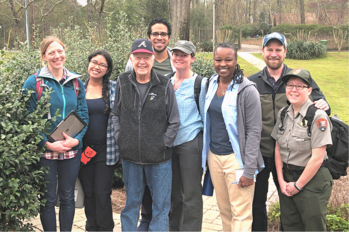 President Jimmy Carter standing with Dr. Jackson and a group of USF students who helped document President Carter’s childhood home in Archery, Georgia as part of a project by the USF Heritage Research Lab.