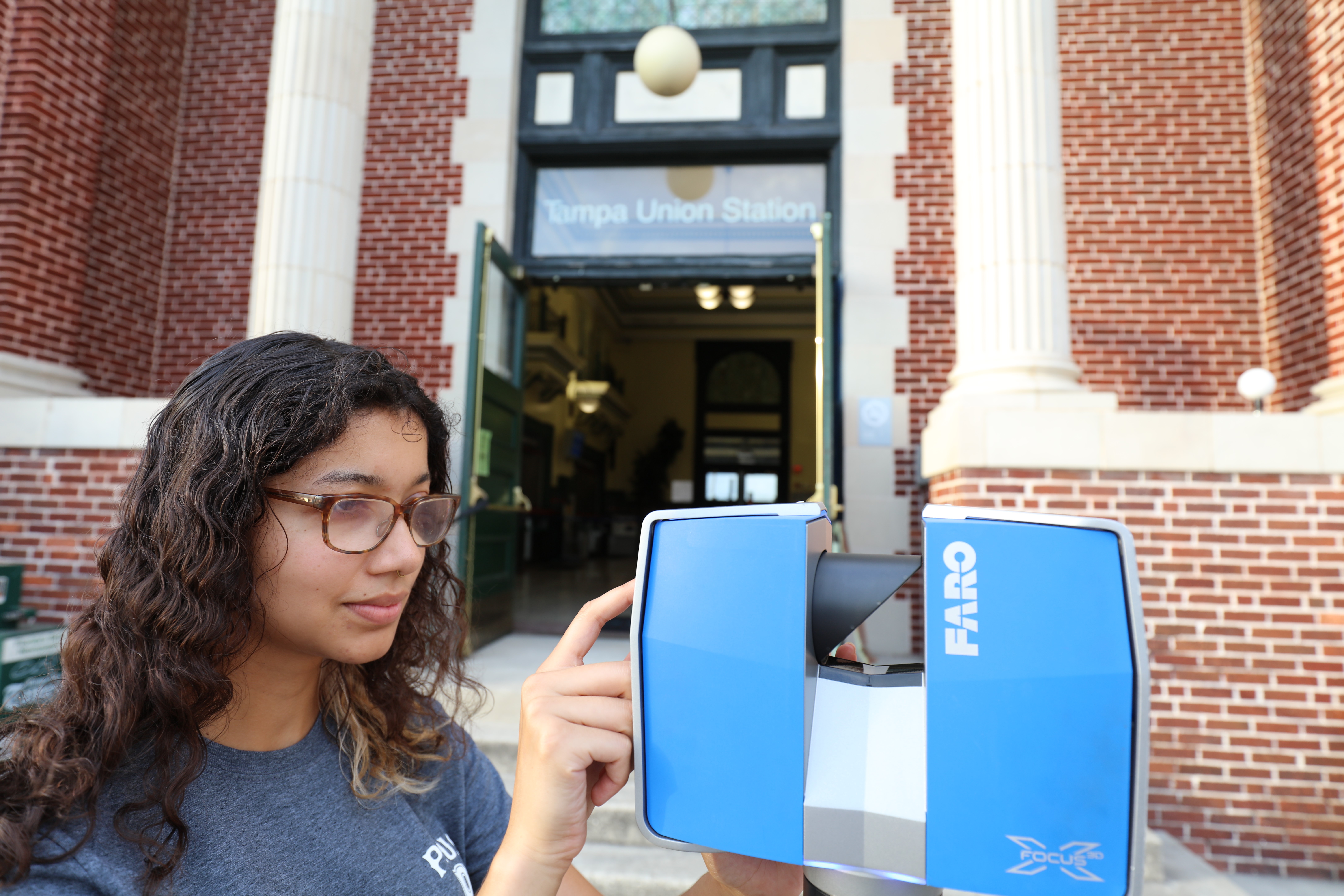 USF student scanning a historic building