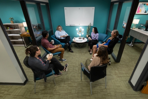 Attendees at the Humanities Institute open house event enjoying breakfast in the newly renovated office space. (Photo by Corey Lepak)