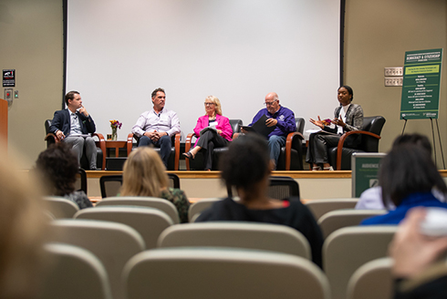 (From Left) Center for Sustainable Democracy Director Dr. Joshua Scacco with panelists Dennis Mont’Ros (Student Programs Coordinator, Center for Leadership and Civic Engagement), Dr. Susan MacManus (USF Professor Emerita), Craig Latimer (Hillsborough County Supervisor of Elections), and moderator Briona Arradondo from Fox 13. (Photo by Corey Lepak)