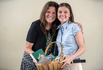 Professor Vicky Phares with student raffle winners. (Photo by Dakota Galvin)