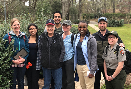 President Jimmy Carter meets with Jackson’s USF Heritage Research Lab team, Quinn Evans, and the National Park Service during a 2019 site visit to the Carter Home and Gardens at Jimmy Carter National Historical Park. (Photo courtesy of Dr. Jackson)