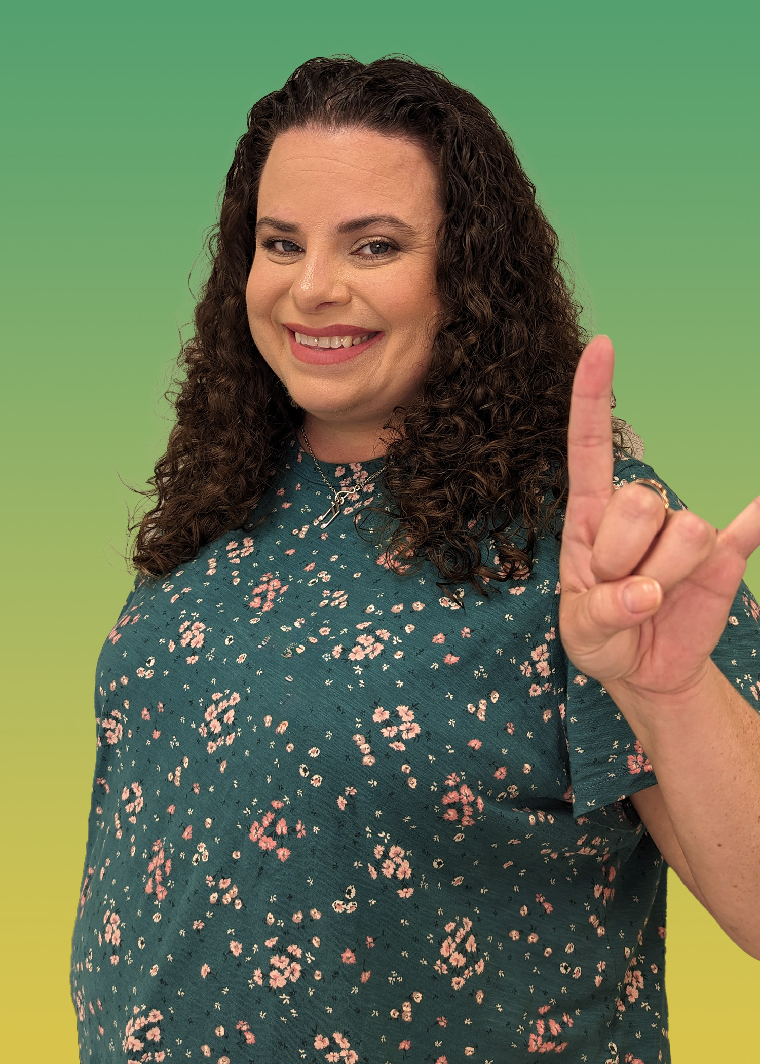 Portrait of Melody Desjardins in Floral Green Shirt.